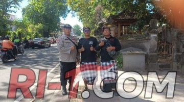 Bhabinkamtibmas Kel. Dangin Puri Bersama Babinsa dan Pecalang Amankan Prosesi Ngaben Warga Banjar Bun